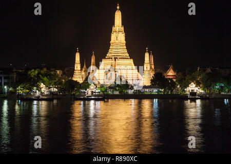 Chao Phraya and Wat Arun at Night, Bangkok, Thailand. Stock Photo