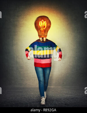 Light bulb instead head power and energy concept. Angry woman holding fists being nervous create electricity impulse. Surreal image idea and creativit Stock Photo