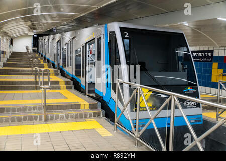 Carmelit an underground funicular railway, one of the smallest subway in the world, only four cars, six stations, single tunnel 1.8 km long. blue subw Stock Photo