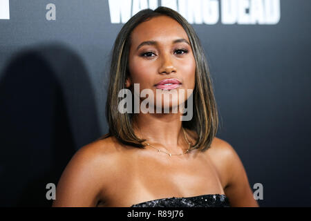 LOS ANGELES, CA, USA - SEPTEMBER 27: Actress Sydney Park wearing a Cavanagh Baker dress arrives at the Los Angeles Premiere Of AMC's 'The Walking Dead' Season 9 held at the Directors Guild of America Theater Complex on September 27, 2018 in Los Angeles, California, United States. (Photo by Xavier Collin/Image Press Agency) Stock Photo