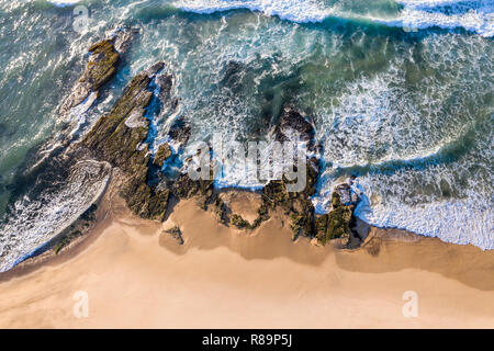 Aerial view of waves running across the rocks at Dudley Beach - Newcastle Australia Stock Photo