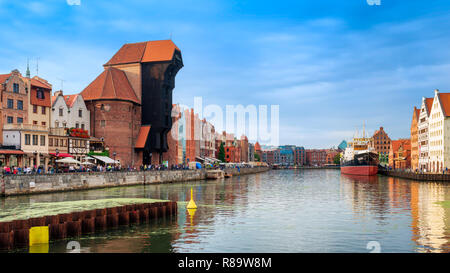 Gdansk old city in Poland with the oldest medieval port crane, called Zuraw, over the river Motlawa; Poland Stock Photo