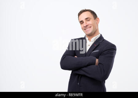 heerful guy laughing and looking at camera with a big grin. Stock Photo