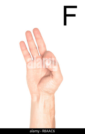 partial view of man showing latin letter - F, deaf and dumb language, isolated on white Stock Photo