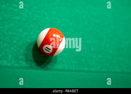 11 Ball from pool or billiards on a billiard table Stock Photo