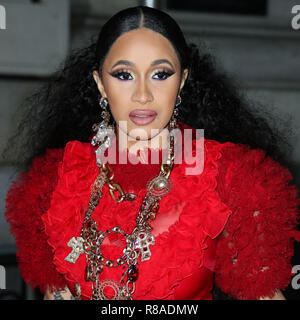 (FILE) Cardi B Charged with Assault. She turned herself in to the N.Y.P.D. on Monday, October 1, 2018. Cardi B has been charged with one count of assault and two counts of reckless endangerment, all misdemeanors, following an alleged incident at a Queens strip club in August. She received a summons for her misdemeanors and turned herself in to the N.Y.P.D. Flushing precinct on Monday morning. After being charged, she will have to appear in court on October 29, 2018. MANHATTAN, NEW YORK CITY, NY, USA - SEPTEMBER 07: Rapper Cardi B (Belcalis Marlenis Almanzar) wearing a Dolce and Gabbana dress a Stock Photo