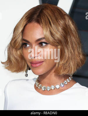 (FILE) Beyoncé named music's most powerful woman by BBC Woman's Hour power list. The superstar came first in a list of the industry's 40 most influential women, thanks to her feminism, activism and empowering musical messages. BEVERLY HILLS, LOS ANGELES, CA, USA - FEBRUARY 22: Singer Beyonce wearing a Stella McCartney dress, Giusuppe Zanotti shoes, Marni clutch, Lorraine Schwartz jewels, and J.Mendel fur arrives at the 2015 Vanity Fair Oscar Party hosted by Graydon Carter held at the Wallis Annenberg Center for the Performing Arts on February 22, 2015 in Beverly Hills, Los Angeles, California, Stock Photo