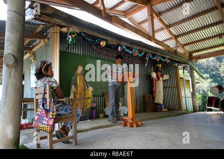 Members of Ifugao community attending a Sunday service at a small church in Dalican barangay of the Banga-An village in the Island of Luzon, Philippines Stock Photo