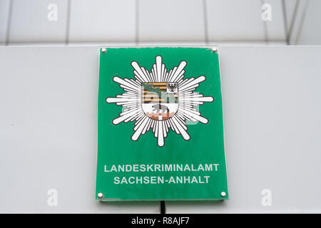 Magdeburg, Germany. 14th Dec, 2018. 'The 'Landeskriminalamt Sachsen-Anhalt' can be read on a sign above the entrance of the police station. In the future, the state police will test the use of drones in everyday police work. Interior Minister Stahlknecht (CDU) handed over four such devices to the State Criminal Police Office of Saxony-Anhalt. Credit: Klaus-Dietmar Gabbert/dpa-Zentralbild/dpa/Alamy Live News Stock Photo