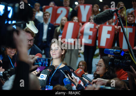 A polish student is seen speaking to the media during the protest at the UN COP24 Climate Change conference. Polish students stage a protest in solidarity with a Swedish 15-year-old Greta Thunberg, A climate activist who was protesting outside the Sweden's parliament refusing to attend school and calling on politicians to take climate issues seriously. Stock Photo
