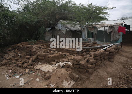 Kakuma, Turkana County, Kenya. 14th Oct, 2018. The shelter of an LGBT Ugandan refugee, which was destroyed by heavy rain.Kakuma refugee camp in northwest Kenya is home to more than 180,000 refugees and asylum seekers, from countries including Uganda, South Sudan, Sudan, Ethiopia, Tanzania and Somalia. Credit: Sally Hayden/SOPA Images/ZUMA Wire/Alamy Live News Stock Photo