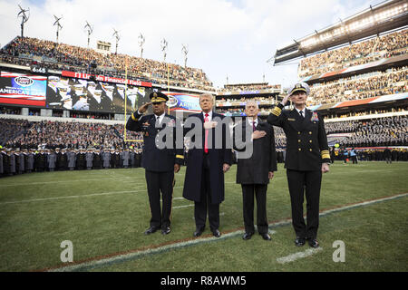 President Donald J. Trump, joined by Secretary of Defense James Mattis, participates in pre-game ceremonies Saturday, Dec. 8, 2018, at the Army-Navy NCAA college football game at Lincoln Financial Field in Philadelphia, Pa.  People:  President Donald Trump Stock Photo