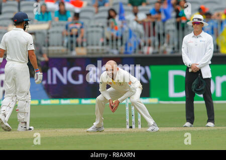 Optus Stadium, Perth, Australia. 15th Dec, 2018. International Test Series Cricket, Australia versus India, second test, day 2; Nathan Lyon of Australia reacts to one of his deliveries Credit: Action Plus Sports/Alamy Live News Stock Photo