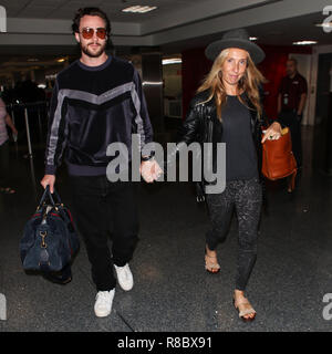 LOS ANGELES, CA, USA - SEPTEMBER 05: Aaron Taylor-Johnson and Sam Taylor-Johnson seen at Los Angeles International Airport (LAX) on September 5, 2018 in Los Angeles, California, United States. (Photo by Image Press Agency) Stock Photo