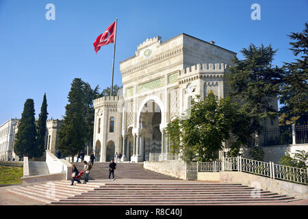 Istanbul, Turkey - November 4, 2015. The portal of Istanbul University at Beyazit Meydani, with people and Turkish flag. Stock Photo