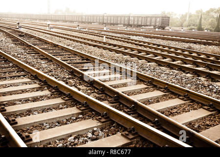 Railway in fog on station, outdoor landscape Stock Photo