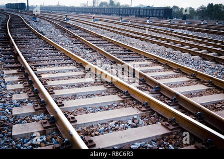 Railway in fog on station, outdoor landscape Stock Photo