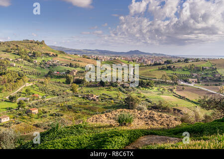 Travel in Italy - Panorama view of roads, houses, mountains, and agrarian fields near Agrigento, Sicily Italy Stock Photo