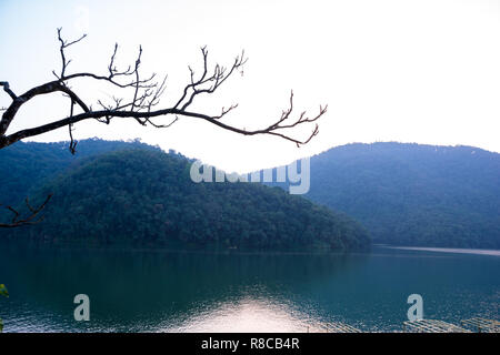 Around Phewa Lake and hills in Pokhara, a popular tourist destination. Taken in Nepal, December 2018. Stock Photo