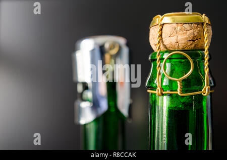 green champagne bottle with cork closeup Stock Photo