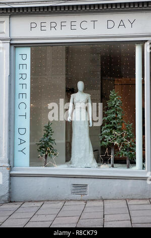 Perfect Day Bridal shop with Christmas window dressing, Silver Street, Bradford on Avon, Wiltshire, UK. Stock Photo