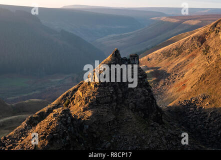 The Tower at Alport Castles above Alport Dale in the Derbyshire High Peak UK where millstone grit strata have slipped over shale beds Stock Photo
