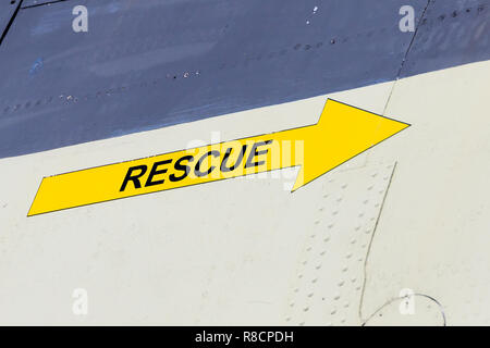 Close up on a yellow Rescue arrow on an old jet plane Stock Photo