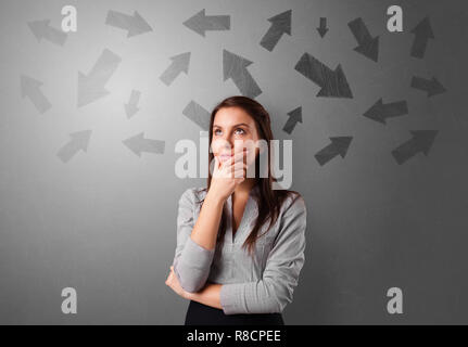 Business person choosing between several directions  Stock Photo