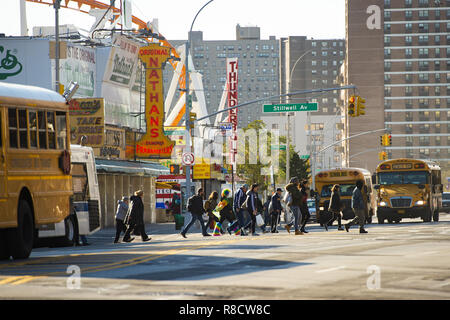 People stroll on the streets of Coney Island on weekends. Stock Photo