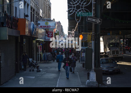 People stroll on the streets of Coney Island on weekends. Stock Photo