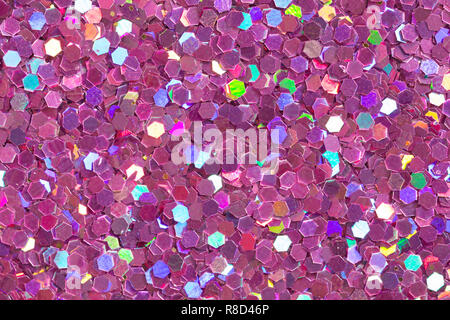 Light violet background with brightness on confetti. Stock Photo