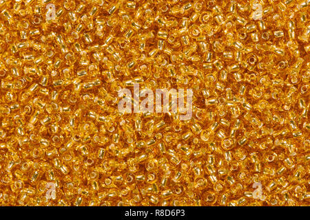 Many orange glass beads. High resolution photo of beads. Stock Photo