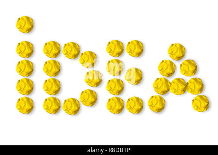 idea inscription from yellow crumpled paper on white background Stock Photo