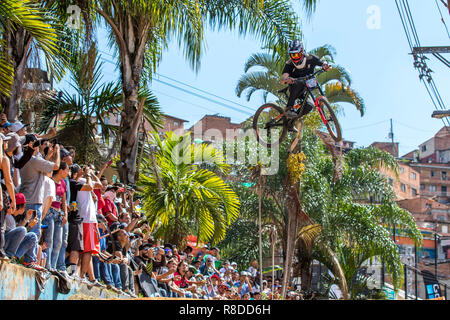 Henry Wilkins touring the track during the Downhill Challenge Medellin 2018. Cycling event that was held this December 2, 2018 in the neighborhoods of Stock Photo