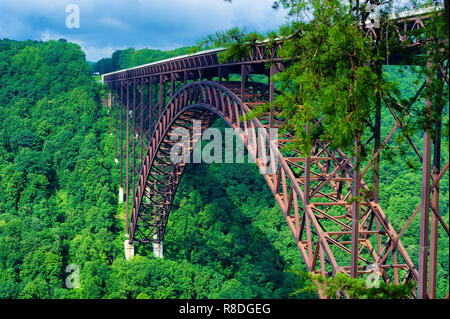 New River Bridge is the worlds fourth llongest steel arch bridge.  The national park service listed it in the National Historic Places.  It spans the  Stock Photo