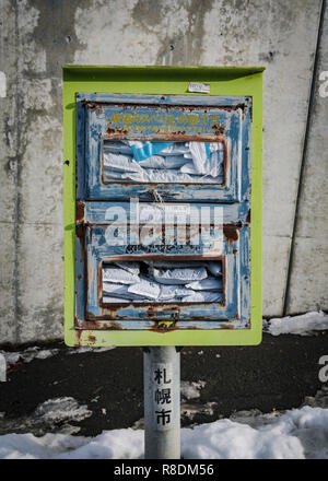 De-icing salt in container, ready for winter services in the streets of Sapporo. Hokkaido, Japan. Stock Photo