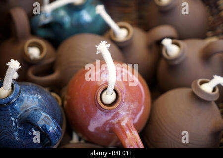 Oil lamps are lighting fixtures that are fueled with oils Stock Photo