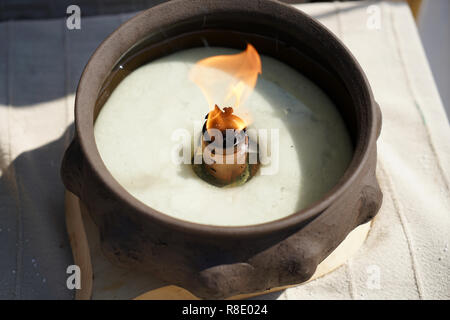 Oil lamps are lighting fixtures that are fueled with oils Stock Photo