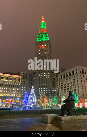 Christmas lights, festive decorations and a skating rink bring the central plaza in downtown Cleveland to life on a cold winter night. Stock Photo