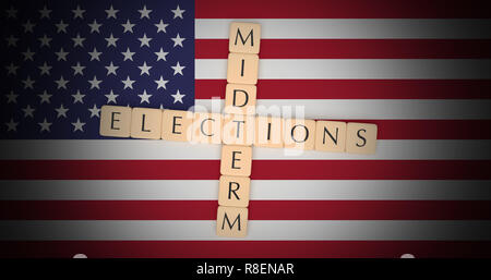 US Politics News Concept: Letter Tiles Midterm Elections On USA Flag, 3d illustration Stock Photo