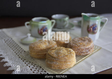 Close-up of a table ready for a coffee and puff pastry filled with angel hair with a vintage decoration Stock Photo