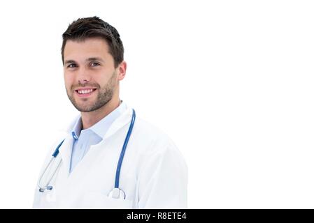 Young male doctor smiling towards camera. Stock Photo