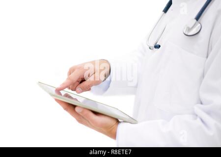 Male doctor using digital tablet. Stock Photo