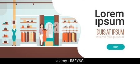 business woman trying on new dress elegant woman looking at mirror fashion shop female clothes market modern shopping mall interior flat horizontal copy space Stock Vector