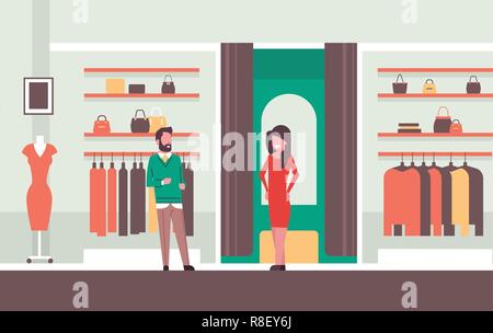 man seller consultant near woman trying on new dress elegant woman looking at mirror fashion shop female clothes market modern shopping mall interior flat horizontal Stock Vector