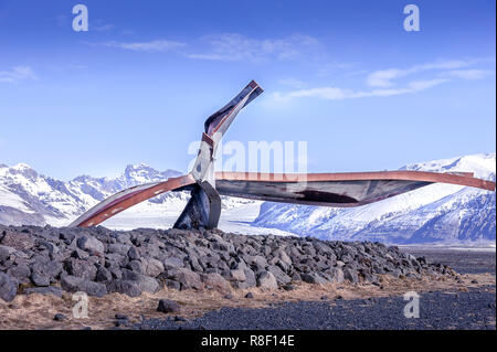 Gigjukvisl bridge remains at Skeidararsandur, Iceland. Twisted metal girders reach to a blue sky. The result of a volcanic eruption in 1996 Stock Photo