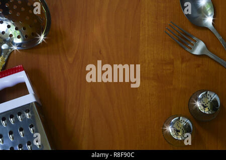 Some kitchen appliances on wood background with space for text. Background for recipes and food lists Stock Photo