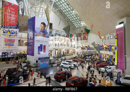 Cars for sale at the atrium of Greenbelt, also known as Ayala Malls Greenbelt, a shopping mall located at Ayala Center, Makati, Metro Manila, Philippines. Stock Photo