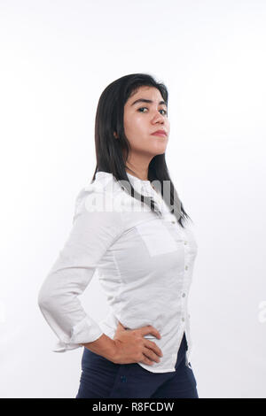 Photo image portrait of a beautiful cute young Asian businesswoman looked very proud and strong with both hands on her waist, half body portrait Stock Photo