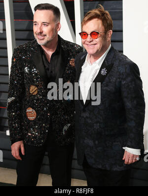 BEVERLY HILLS, LOS ANGELES, CA, USA - FEBRUARY 26: David Furnish, Elton John arrives at the 2017 Vanity Fair Oscar Party held at the Wallis Annenberg Center for the Performing Arts on February 26, 2017 in Beverly Hills, Los Angeles, California, United States. (Photo by Xavier Collin/Image Press Agency) Stock Photo